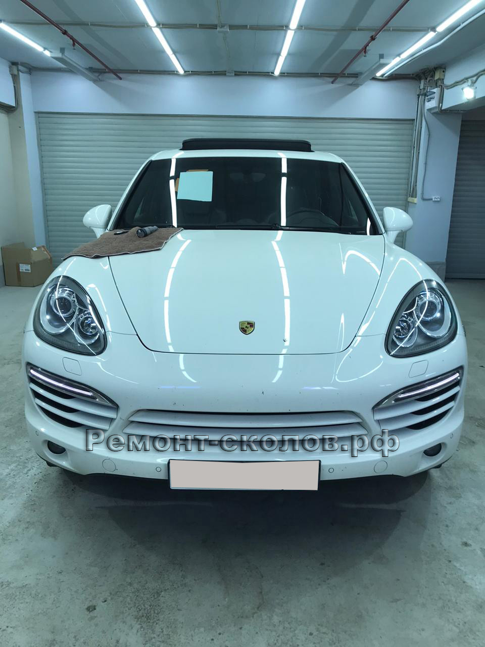 Результат ремонта скола лобового стекла Porsche в ЮЗАО